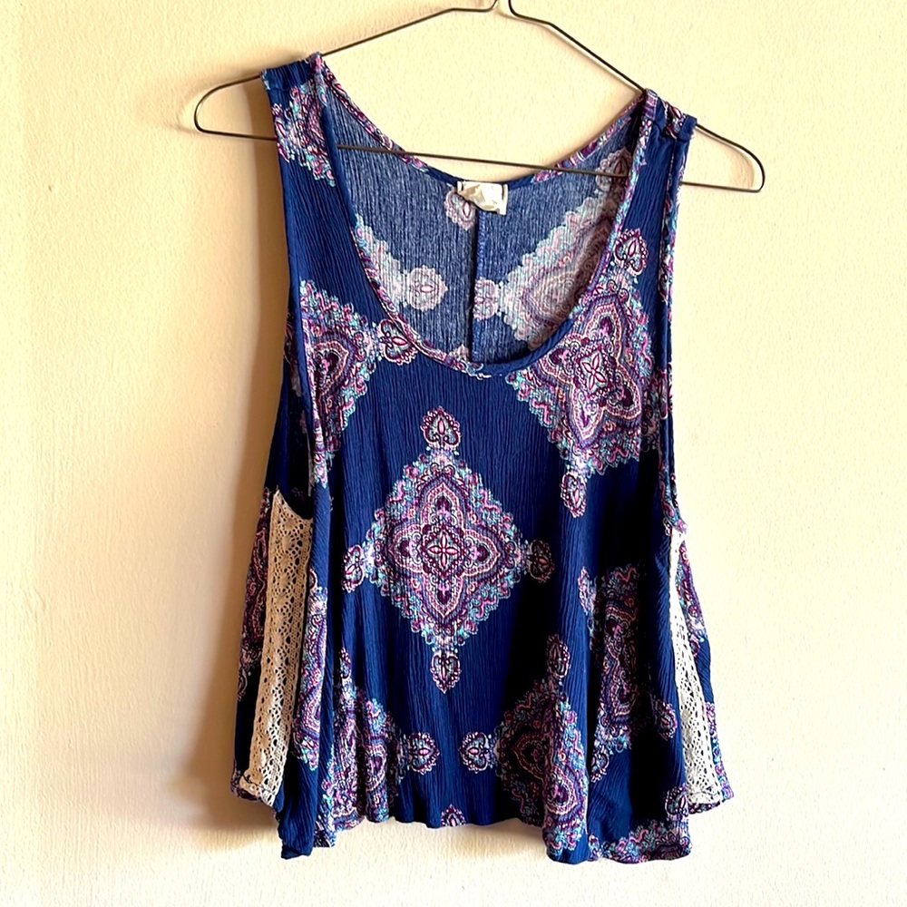 Blue top with kaleidoscope type print
